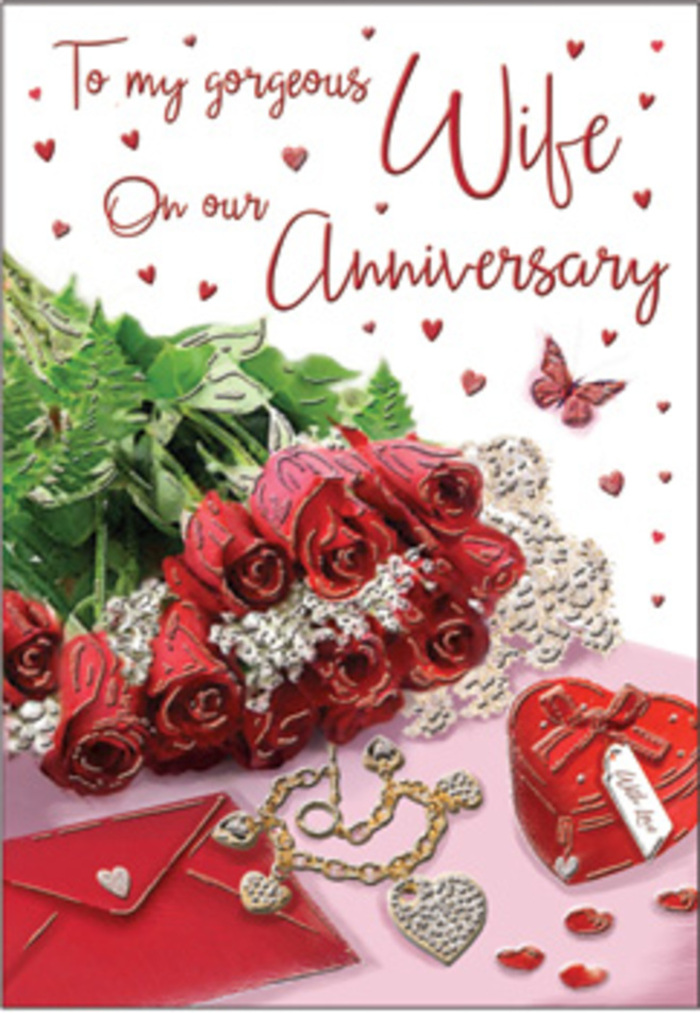 A richly styled anniversary card is presented like a treasured vignette you might find on a mantelpiece in a cosy Yiewsley home. At the heart of the image is a bouquet of classic red roses, each bloom fully open and luxuriously rounded, wrapped with understated elegance to keep the focus on their deep, passionate colour. The petals appear soft and almost satin-like, with gentle highlights that hint at natural daylight filtering through a nearby window. Interwoven green foliage brings a touch of freshness and life, reminiscent of the green pockets around Yiewsley that locals stroll through at the weekend. Resting alongside this romantic cluster is a piece of jewellery-perhaps a delicate necklace or matching set-arranged with the same care you might use when preparing an anniversary surprise. A vivid red keepsake box, its surface smooth and inviting, suggests a cherished gift waiting to be opened, echoing the excitement of receiving a special delivery from a local florist. Scattered across the surface are petite heart shapes, some shining, some matte, like confetti gently strewn after a celebration in a favourite Yiewsley restaurant. Subtle lace-like textures and hints of gold and velvet weave through the composition, adding layers of luxury without overwhelming the simple message of love. The card's scripted wording flows across the scene in soft curves, underscoring the romantic mood. Everything-the roses, the gifts, the tender details-works together to evoke years of shared moments and the reassuring warmth of a relationship that continues to feel new, even as it deepens with time.