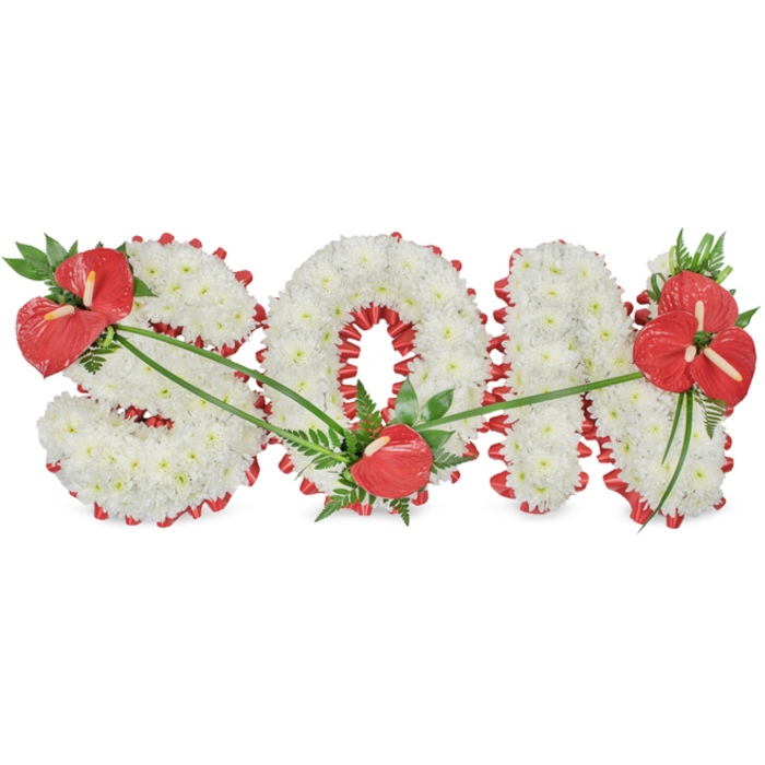 This image shows an elegant funeral flower tribute crafted to spell out the word SON in large, uppercase letters, rendered with the quiet precision you might expect from a long-established Yiewsley florist near the High Street. The letters stand side by side on a stark white background, their shapes robust and clearly defined. Each character is completely upholstered in tightly packed white chrysanthemums, the blooms placed so closely together that they create a smooth, plush surface with gentle shadows nestling between the petals. Beneath and around this blanket of white, a rich red satin ribbon or fabric is folded into a scalloped edging that frames each letter, its deep colour and soft sheen creating a striking outline against the crisp white florets. Three main focal points of vivid red anthuriums punctuate the design. On the upper left curve of the S, a plentiful cluster of glossy, heart-shaped anthuriums rises from a bed of dark green leaves and feathery fern, giving the impression of a small garden arranged upon the letter. At the base of the O, a single anthurium, equally glossy and intense in colour, rests like a quiet accent, adding subtle depth. The N is crowned on its upper right by a fuller arrangement of anthuriums and textured greenery, anchoring the word visually and emotionally. Slender green stems and leaves arc across the letters, almost like gentle brushstrokes connecting each cluster, drawing the eye along the tribute. The overall feeling is one of solemn beauty, a personalised memorial piece ready to be placed at a funeral service or graveside in Yiewsley, West Drayton, or nearby churchyards, honouring a cherished son with grace and care.