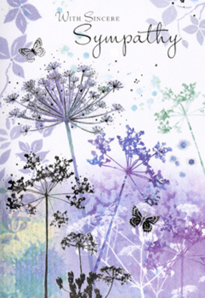 There is a meditative tranquillity to this sympathy card, as if the quiet edges of Yiewsley's canal paths have been distilled into ink and watercolour. Tall, slender wildflower stems rise from the lower edge of the card in an organic rhythm, some leaning slightly as though shaped by a soft breeze, others standing straight in subtle, dignified lines. Their heads are formed of intricate umbels, each one a fine filigree of tiny blossoms in lavender, muted violet, and dusky blue, with silvery undertones that suggest early light touching dew. The blooms appear almost etched by hand, delicate but determined, evoking nature's resilience even in the midst of sorrow. Behind them, a softly blurred wash of pale purple and powdery blue spreads across the card, with gentle transitions that mimic distant fields fading into sky. Nothing is harsh; edges melt into one another, leaving a soothing, almost dreamlike background. Two butterflies float above the higher stems, their pale wings softly outlined so they seem to hover rather than dominate, hinting at continuity and the quiet passage from one season of life to another. The lighting feels diffuse and comforting, like the glow before sunset over nearby green spaces, wrapping the whole scene in a subtle embrace. This is not a loud or heavily ornamented card, but one that invites a pause, a deep breath, and a moment of reflection. It feels like something chosen thoughtfully for a neighbour in Yiewsley, perhaps alongside understated funeral flowers, to say, with sincerity and gentleness, that their grief is seen and shared.