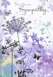 This sympathy card unfolds like a gentle visual poem, echoing the soft stillness you might feel walking through a quiet corner of Yiewsley at dusk. Across the front, airy silhouettes of wildflowers stretch upward, their stems impossibly fine and slightly curved, as if reaching for a calm, lavender sky. The umbels at their tips are intricate and lace-like, made of countless tiny florets suggested in strokes of lilac, indigo, powder blue, and misted grey. Rather than stark outlines, the flowers appear almost translucent, giving the impression of petals catching a faint breeze. Hints of foliage drift in the background, rendered in the palest sage and cool blue, barely there yet adding depth, like shadows of grasses along the canal edge. Over this serene floral scene, two or three butterflies hover, their wings sketched with the lightest touch, symbolising a soft, comforting presence rather than dramatic change. The colour palette stays cool yet kind, soaked in gentle lavender, muted blue, and silvery green, creating an atmosphere that soothes rather than overwhelms. In the upper portion of the card, the words With Sincere Sympathy are written in a flowing, elegant script, the lettering harmonising with the slender stems below. Everything about the design feels respectful and understated, much like a quiet condolence offered after a funeral service, when words are few but care runs deep. Crafted with the sensitivity of a local florist who understands the community, this card pairs beautifully with simple floral tributes delivered to homes and churches around Yiewsley, offering visual comfort when hearts are heavy.
